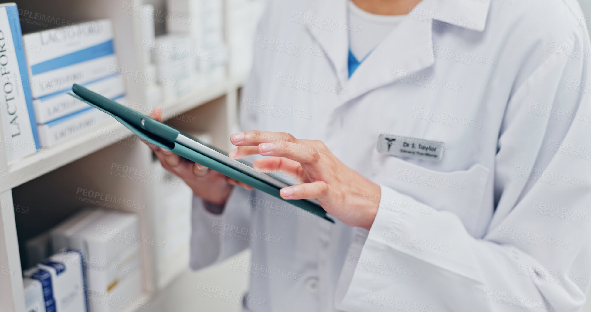 Buy stock photo Chemist, hands and scroll in pharmacy with tablet, telehealth website or review order for medication. Pharmacist, person and typing in dispensary with tech, app or check online prescription for drugs