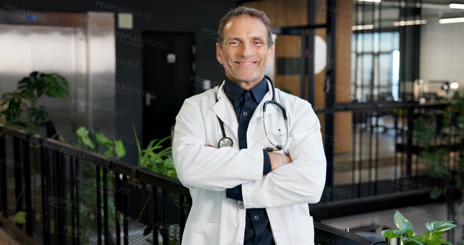 Buy stock photo Healthcare, doctor and pride in portrait in hospital lobby, expert physician or heart specialist. Mature, man or cardiologist for medical care, confident or arms crossed with professional in medicine
