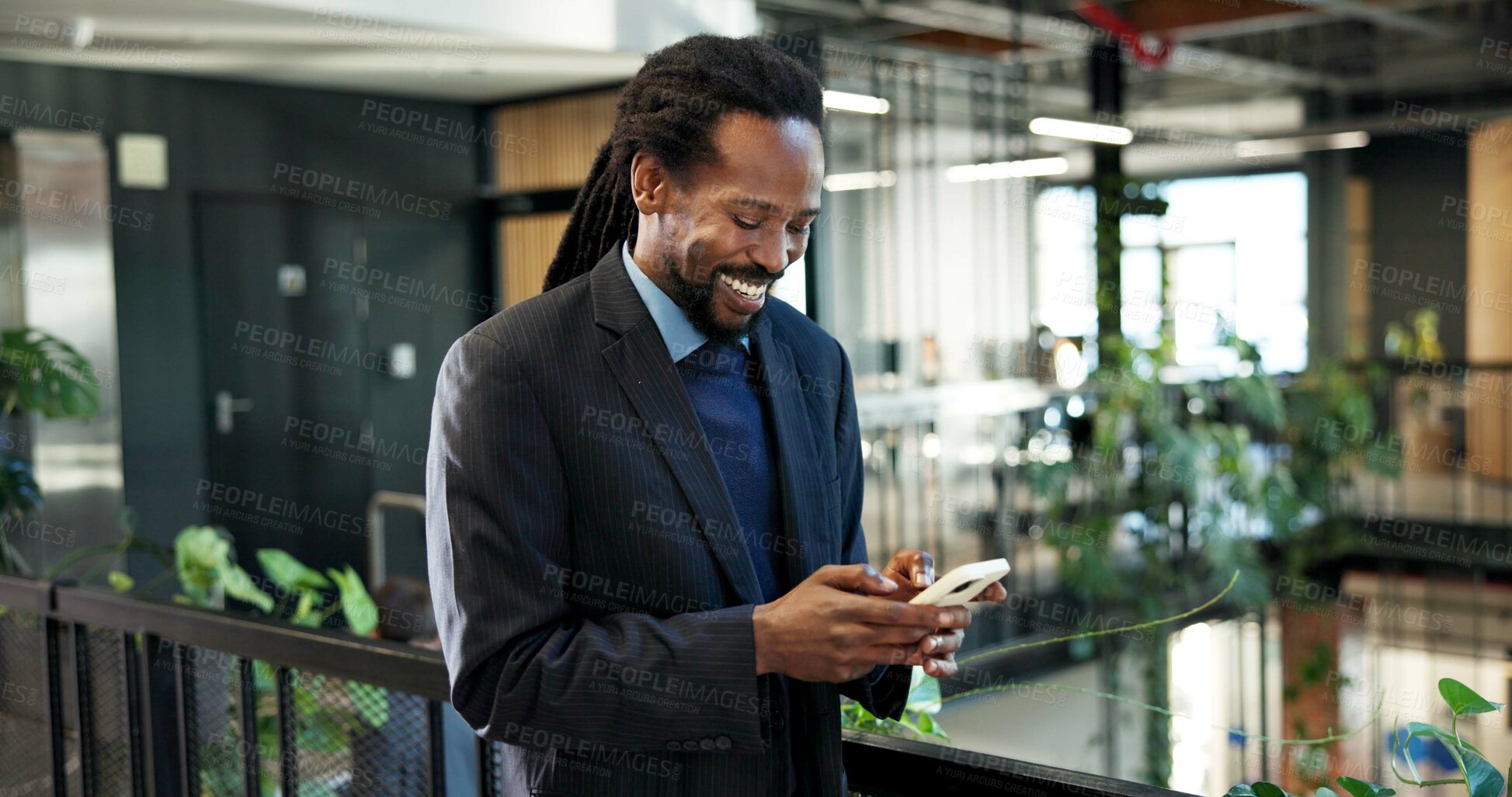 Buy stock photo Businessman, laughing and chatting with phone in office, communication or project update on website. Typing, online and black person with smile for message, happy and network with contact on mobile