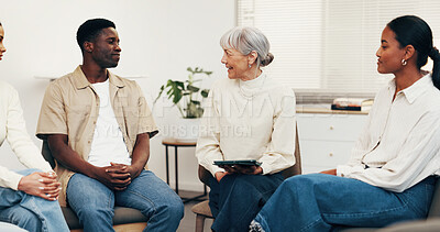 Buy stock photo Happy, therapist and talk with tablet for group therapy, coping mechanism and relapse prevention. Community center, people and mature counselor with tech for counseling, addiction recovery or support