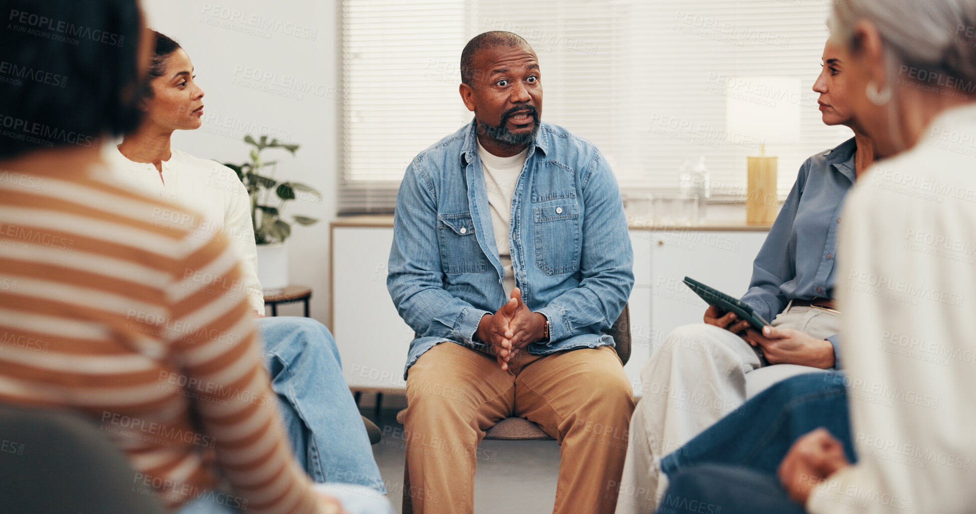 Buy stock photo Psychology, man and serious with talk for group therapy, recovery experience or trigger discussion. Counseling, mature member and share story for relapse prevention, coping mechanism and trust circle