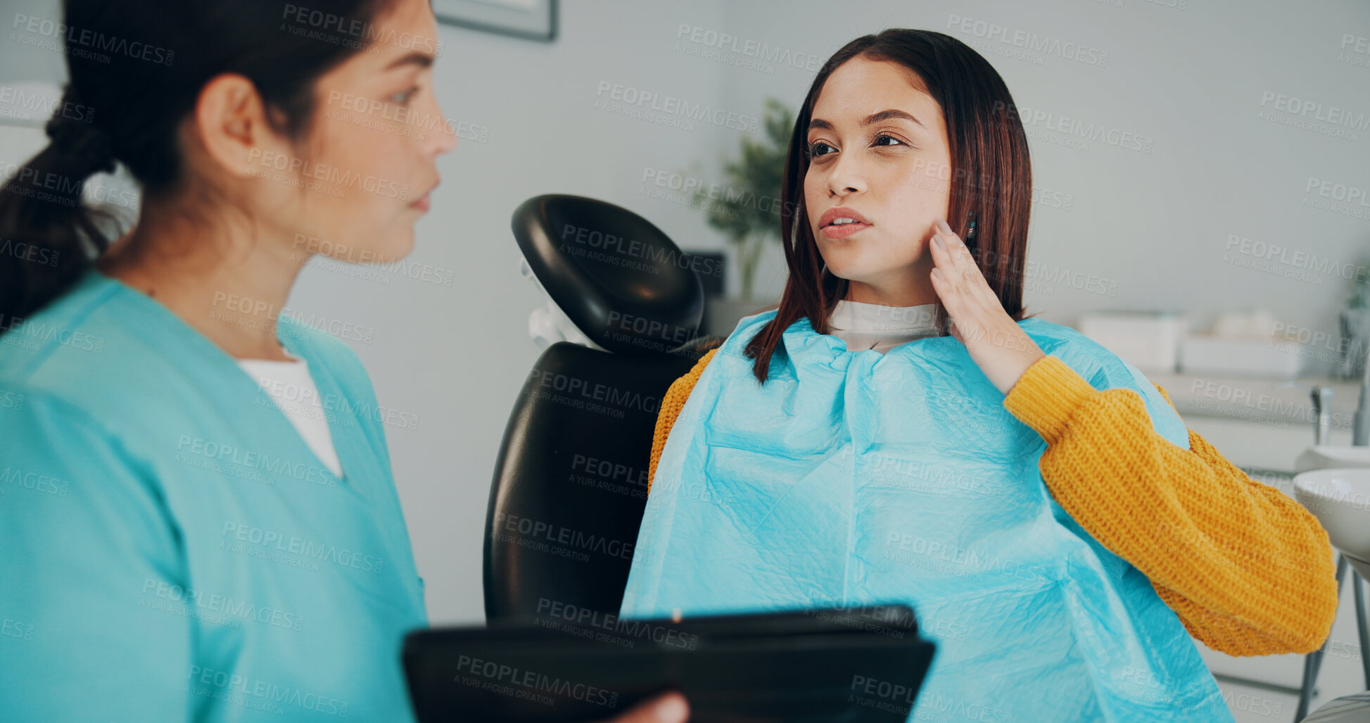 Buy stock photo Women, dentist and tablet with patient for discussion, oral care treatment options in clinic. Hygiene, conversation and people with dentistry consultation for root canal, dental surgery or xray