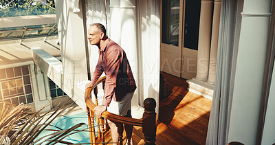 Buy stock photo Smile, man and balcony at hotel for holiday, adventure and guest check in at luxury accommodation. Above, mature person and terrace at retreat with view, travel experience and weekend getaway
