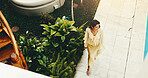 Thinking, woman and happy at resort for holiday, adventure and guest exploring at accommodation. Above, mature person and reflection at retreat with scenic view, travel experience and weekend getaway