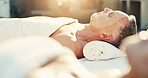 Spa, massage and senior man with face mask, luxury and facial treatment on vacation and exfoliation. Resort, guest and retired person on holiday, relaxation therapy and self care on break or wellness