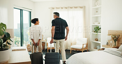 Buy stock photo Couple, walking or hotel with suitcase for holiday, weekend check in or romantic getaway together. Man, woman or travel with bags in bedroom for honeymoon vacation or trip in luxury resort or retreat