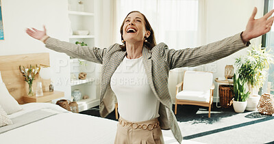 Buy stock photo Excited, woman and celebrate at new house for success, loan approval and milestone of real estate. Smile, mature person or arms spread in home for good news, financial freedom and property investment