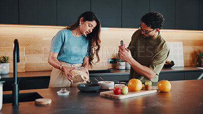 Buy stock photo Phone, couple or cooking breakfast with recording for tutorial, nutrition vlog or live streaming. Meal prep, woman and man with mobile in home kitchen, pour oats or morning food blog for healthy diet