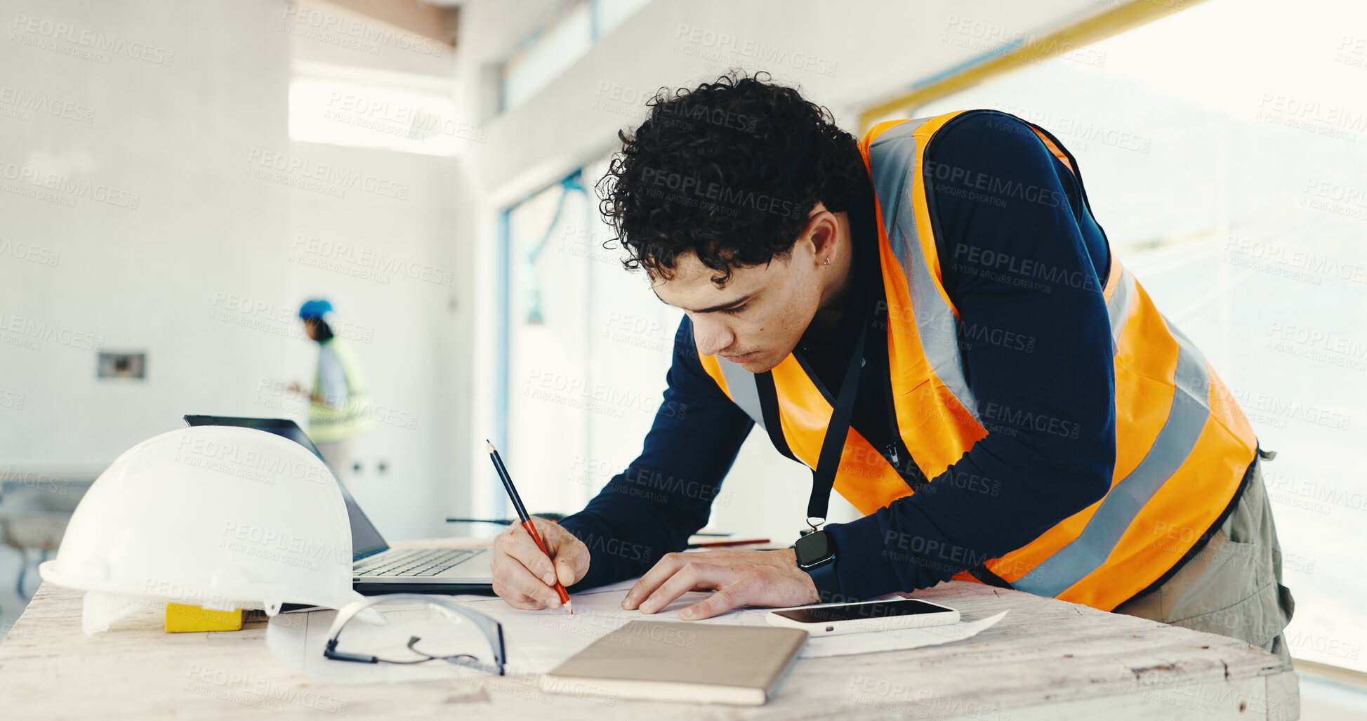 Buy stock photo Man, architect and writing with documents on construction site for building design or planning. Male person, contractor or civil engineer taking notes with blueprint for architecture project or ideas