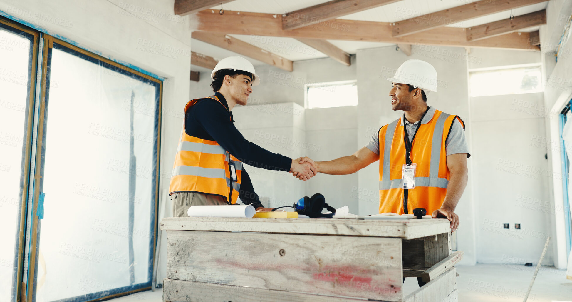 Buy stock photo Architect, men and meeting with handshake on construction for building agreement or partnership. Male people, contractor or civil engineer shaking hands with smile for architecture project or deal