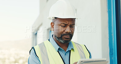 Buy stock photo Concern, black man and tablet on construction site for inspection, safety regulations or building. Mature person, architect and worried with tech for infrastructure, renovation issue or security