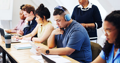 Buy stock photo Man, student or headphones in lecture with tablet, research assignment or reading requirements. Academic, tech or online in community college for learning, video tutorial or education platform on app