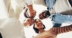 Below, huddle and happy people in office with hug, good mood or coworkers together for collaboration. Support, team diversity and embrace in business meeting with smile, group solidarity and synergy.