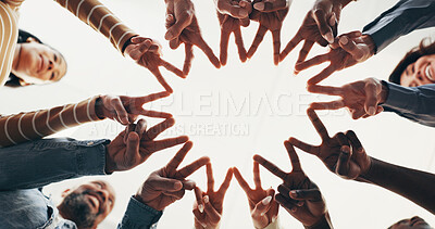 Buy stock photo Below, hands and business people in office with peace sign, solidarity and collaboration for project. Company, group and v shape with connection for teamwork, cooperation and synergy in workplace.