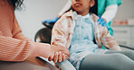Dentist, mom and holding hands with child in clinic for support, oral treatment or trust together. Mother, parent or guardian with girl or patient in dentistry for dental appointment or surgery