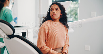 Buy stock photo Worry, fear and woman with dentist in clinic for tooth extraction, cavity removal or oral treatment. Healthcare, orthodontist and scared patient thinking for dental hygiene, surgery and toothache