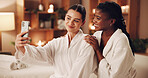 Selfie, women and friends with picture in spa for health, wellness or beauty day in luxury resort. Female people, relax and capture moment with smile in robe for pamper vacation or memory in salon