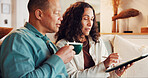 Tablet, coffee break and couple in living room on sofa, streaming video or bonding. Digital tech, relax and mature man with woman and networking for social media research or internet browsing in home