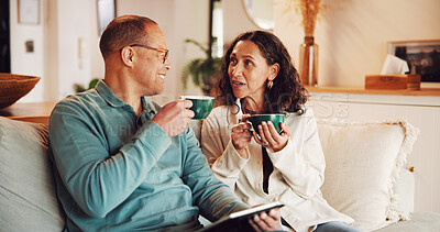 Buy stock photo Tablet, coffee break and couple in home living room on sofa, streaming video and bonding. Digital tech, relax and mature man with woman and networking for social media research or internet browsing
