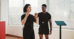 Exercise, gym and woman with trainer and ems suit for intense workout, strength training or fitness. Sports, athlete and person with tech sportswear for muscle stimulation, endurance and strong body