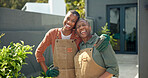 Senior, mother and happy woman in backyard for gardening, eco friendly hobby and bonding at home. Black family, pensioner and adult daughter with hug, plant care and garden maintenance with portrait