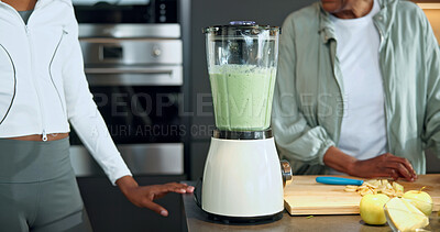 Buy stock photo People, fruit and blender at house for smoothie, healthy drink and fresh produce for nutrition. Hands, family and machine in kitchen with ingredients, detox beverage and protein shake for gut health