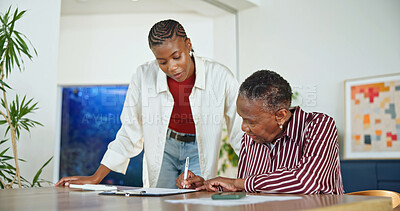 Buy stock photo Document, senior mother and help with woman in home for insurance application, budget or pension. Computer, adult daughter or parent writing on form for signature, retirement policy and black family