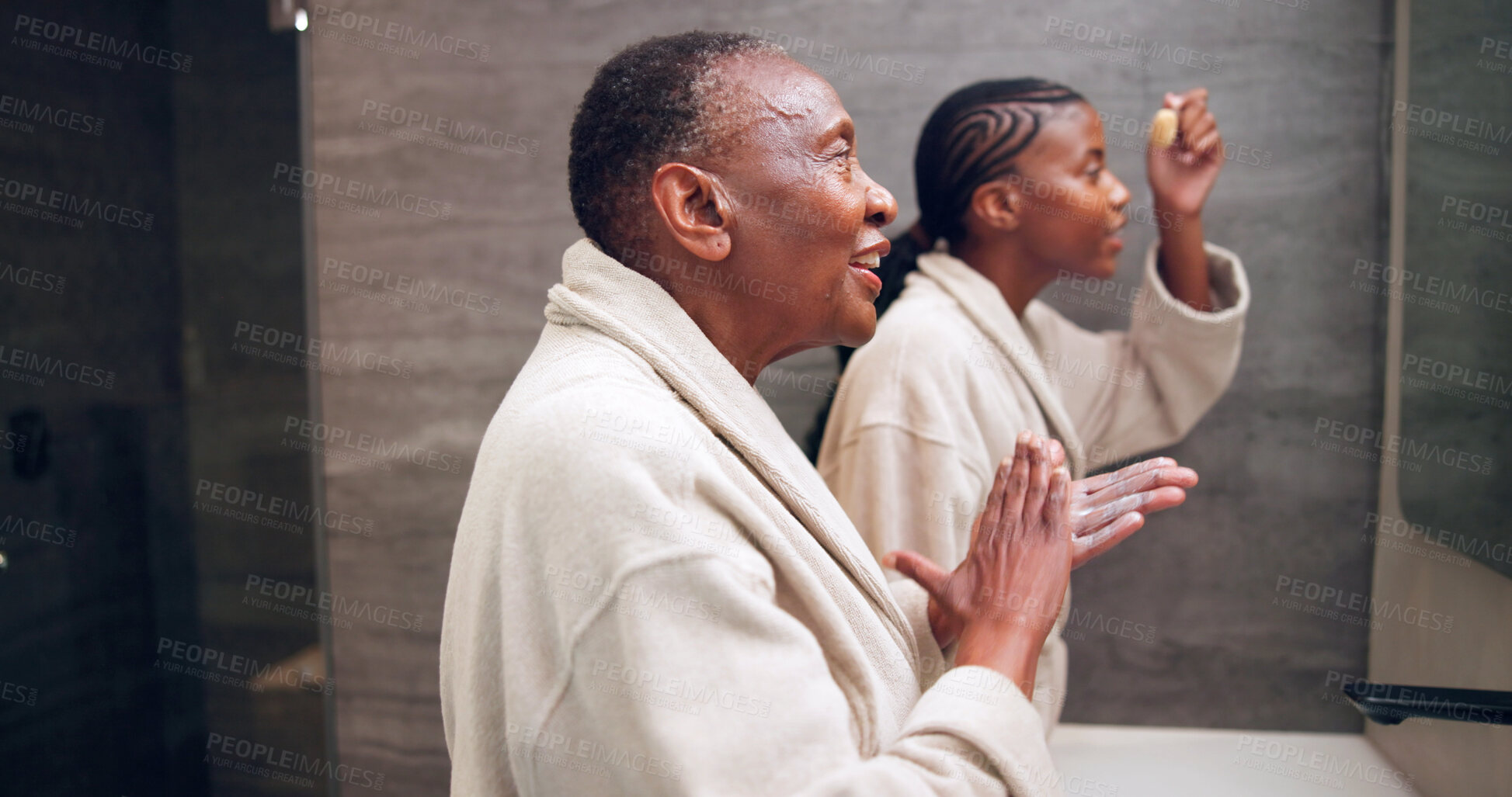 Buy stock photo Bathroom, skincare and senior mother with woman, beauty or cream for hydration in morning with smile. Black family, old parent and adult daughter with makeup, lotion or skin wellness for care at home