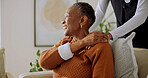 Old woman, thinking and holding hands with caregiver in nursing home, smile and gratitude for help. Assisted living, nurse and support for senior black person, healthcare and happy patient in lounge