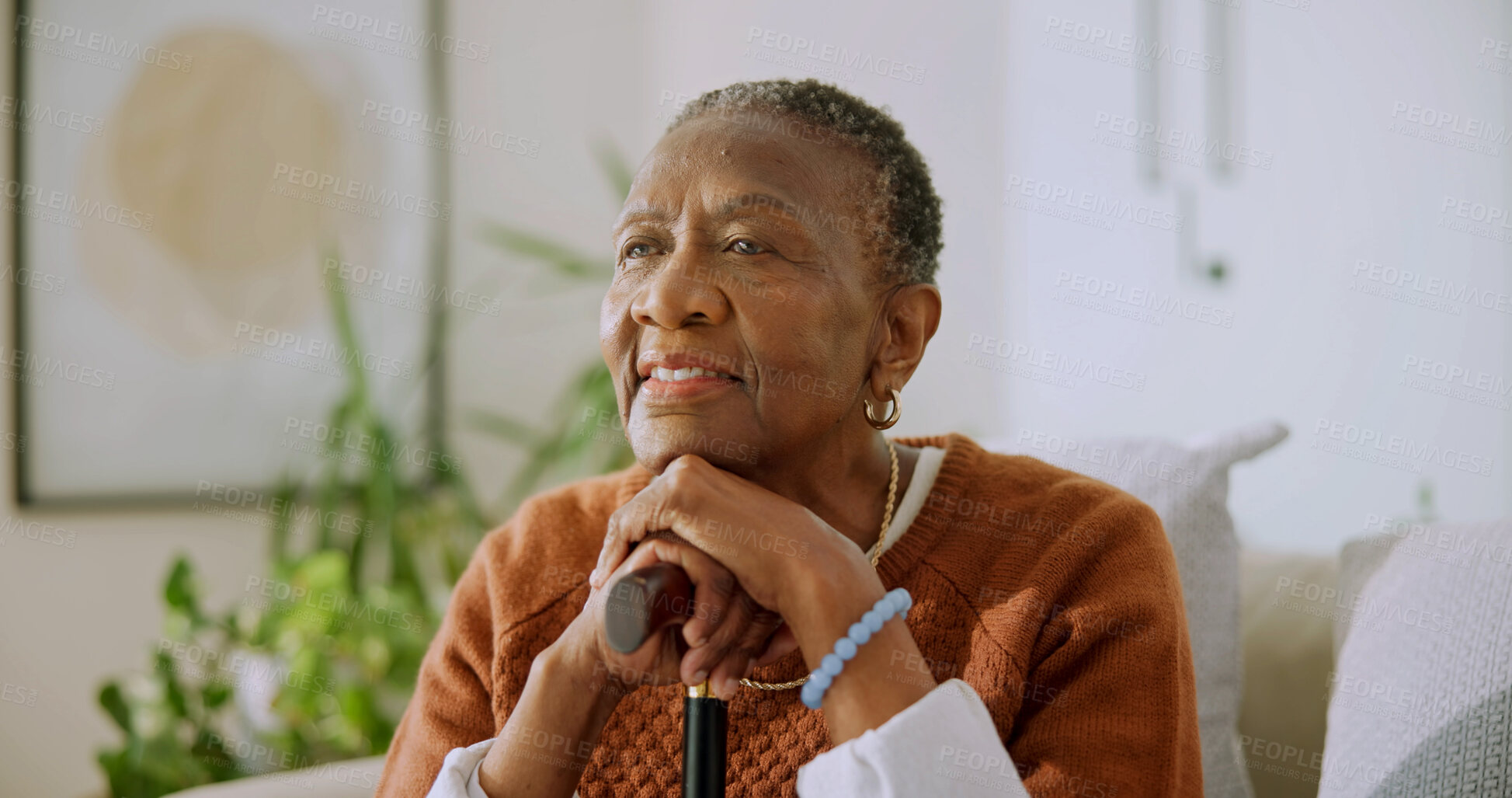 Buy stock photo Happy, walking stick and senior woman in home for wellness, thinking and reflection with aid. Smile, retirement and African person with cane for mobility, arthritis and balance for movement on sofa