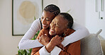 Old woman, hug and holding hands with caregiver in nursing home, connection and gratitude for help. Assisted living, nurse and embrace with senior black person, healthcare and happy patient in lounge