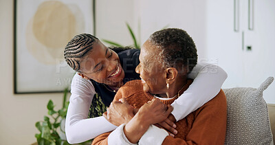 Buy stock photo Old woman, laughing and holding hands with daughter in home, support and bonding together in lounge. Family, connection and hug with senior black person, love and happy with mother in living room