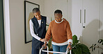 Caregiver, support and old woman with walker in nursing home, recovery and help for senior patient. Healthcare, nurse and walking with elderly person, happy and assisted mobility for rehabilitation