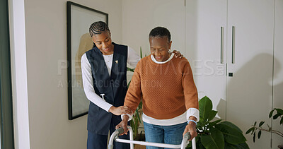 Buy stock photo Caregiver, support and old woman with walker in nursing home, recovery and help for senior patient. Healthcare, nurse and walking with elderly person, happy and assisted mobility for rehabilitation
