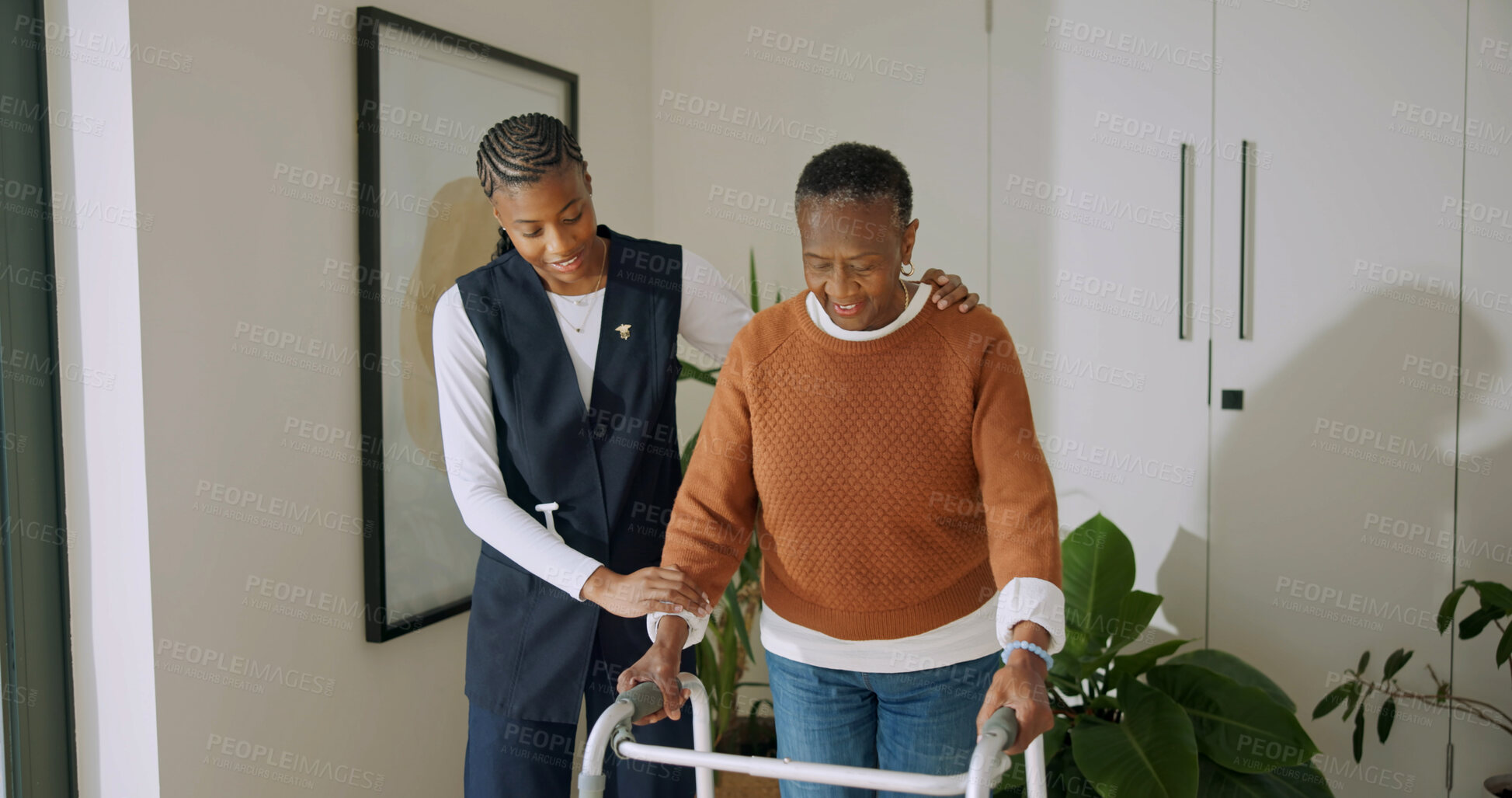 Buy stock photo Caregiver, support and old woman with walker in nursing home, recovery and help for senior patient. Healthcare, nurse and walking with elderly person, happy and assisted mobility for rehabilitation