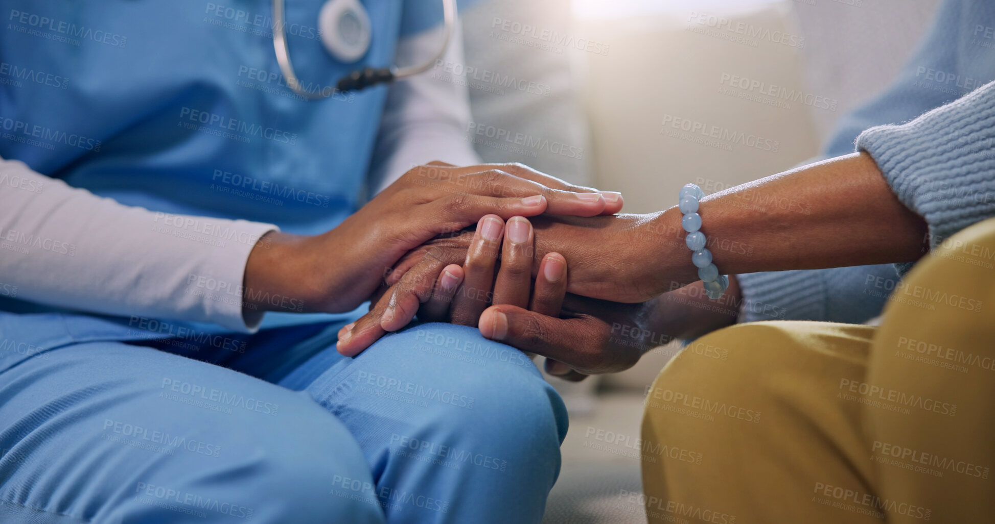 Buy stock photo Hands, patient and caregiver with support in nursing home, helping and health with empathy. People, nurse and aid in healthcare, comfort and assisted living for wellness, consultation and kindness