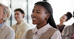 Crowd, attention and woman in conference for training, listen or company workshop insight with smile. Happy, person and engagement with seminar audience, career development and learning at convention