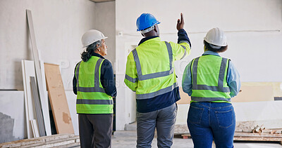 Buy stock photo Engineer, walk and team meeting at construction site with inspection, technician or electrical plan. Back, supervisor and people check infrastructure with electrician, building project or engineering