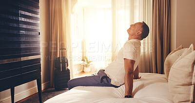 Buy stock photo Man, thinking and relax on hotel bed with smile, weekend getaway and peace for downtime on vacation. Happy, mature person and rest in accommodation with reflection, good mood and vision for holiday.