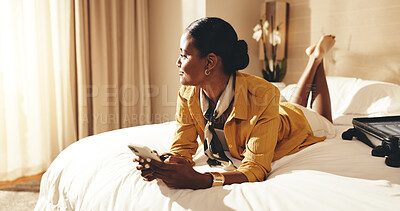 Buy stock photo Woman, relax and thinking in hotel room with phone, text message and planning for tourist vacation. Person, reflection and chill in accommodation with tech, internet connection or travel for holiday.