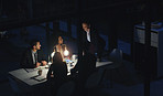 Woman, speech and team at night for office meeting with smile, documents or review at law firm. Men, women and corporate lawyer with tech, overtime or problem solving with feedback at legal agency