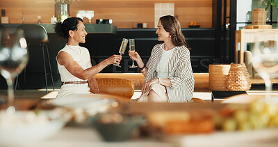Buy stock photo Happy, friends and toast in home with champagne, bonding together or visit for connection on weekend. Mature women, relax and cheers in living room with alcohol drink, care and smile for friendship.