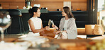 Friends, relax and toast in home with champagne, bonding together or congratulations for achievement. Happy, mature women and cheers on sofa with alcohol drink, conversation or celebration of success