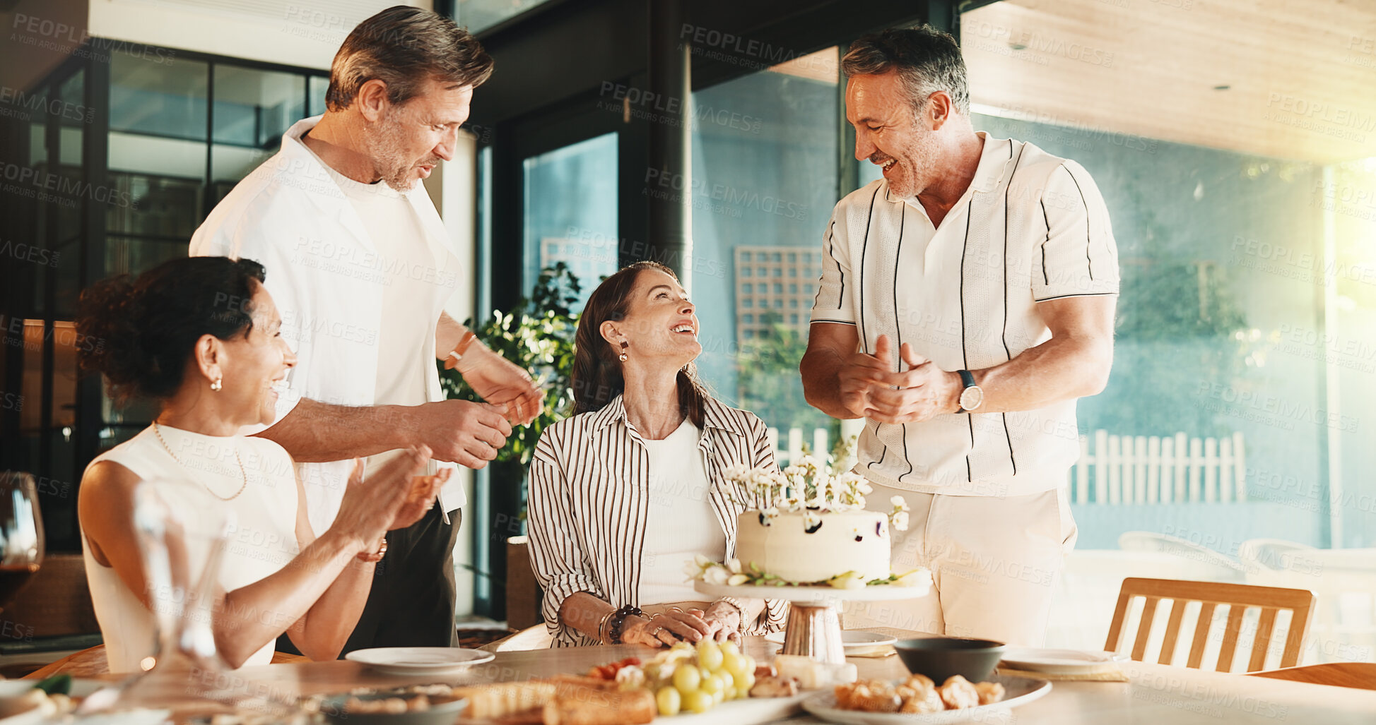 Buy stock photo Happy, people and birthday cake with applause in home for celebration, event or social gathering. Mature group, dessert or clapping with food or wish for get together, friendship or reunion in house