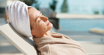Buy stock photo Woman, relax and sleeping by swimming pool in resort for holiday getaway, summer break or vacation. Mature person, asleep or catching tan with stress relief for weekend accommodation in luxury spa