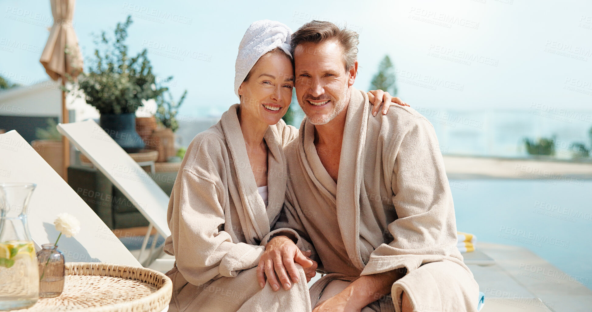 Buy stock photo Portrait, couple and relax at resort for travel, love and bonding together on summer holiday. Smile, mature people and embrace at luxury retreat for peace, partner affection and fresh air on vacation