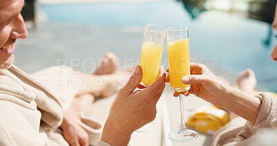 Buy stock photo Hands, cheers and couple with drink for vacation, holiday getaway or romantic date in luxury resort. Man, woman and relax with toast by swimming pool for weekend trip or accommodation in beauty spa