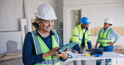 Buy stock photo Construction, smile and woman on site with tablet, project agenda and progress track for renovation. Happy, ppe and mature supervisor with tech, operation schedule and inspection report in remodeling