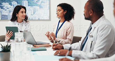 Buy stock photo Boardroom, doctors and group with laptop, discussion and health research with colleagues in meeting. Healthcare, team and people with technology, happy and collaboration with treatment plan on web