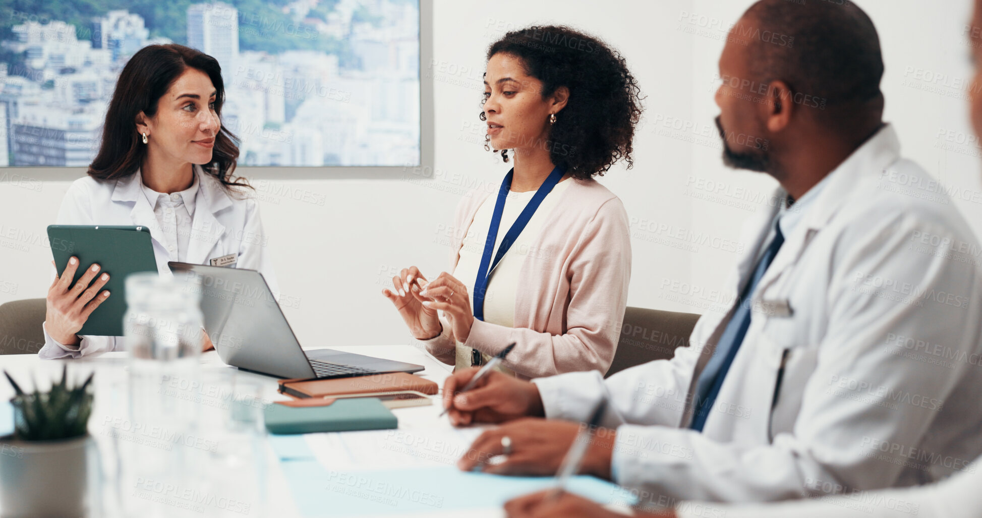 Buy stock photo Boardroom, doctors and group with laptop, discussion and health research with colleagues in meeting. Healthcare, team and people with technology, happy and collaboration with treatment plan on web